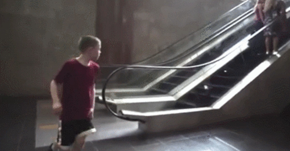 Clown Throwing Pie On Escalator