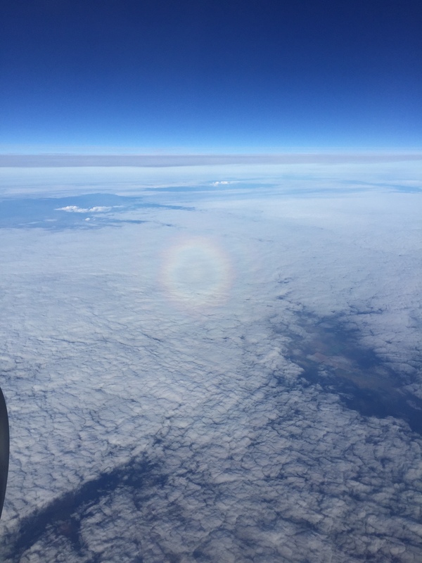 Probably a rainbow. View from the window of the aircraft. - My, Vacation, Porthole, Rainbow, Clouds