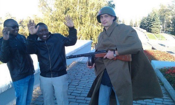 A Red Army soldier takes blacks prisoner... - Black people, Helmet, Ppsh