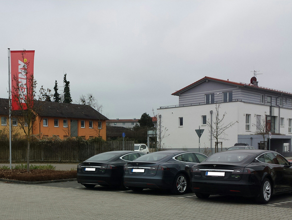 Just modest cars in a modest parking lot near a modest shop in a modest village... - My, Tesla, Parking, Germany, Score, a penny, 