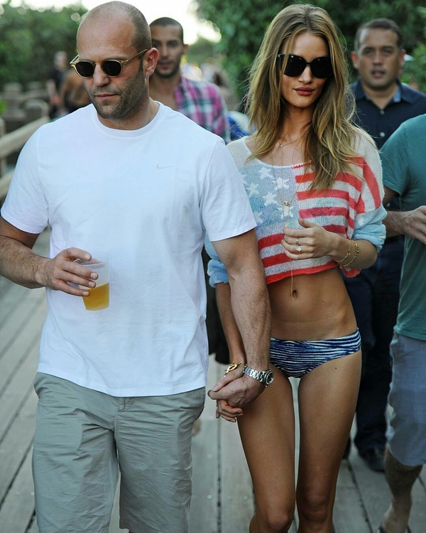 Jason Statham with a beer and a bicycle. - Jason Statham, Rosie Huntington-Whiteley