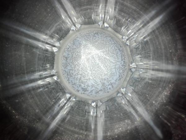 Salt crystal at the bottom of a glass of mineral water, similar to frost - Photo, Salt, Minerals