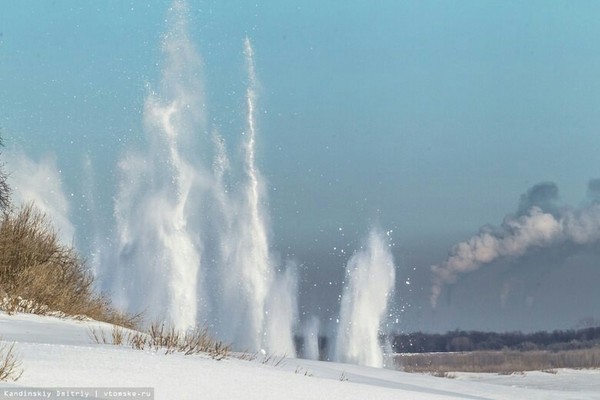 Ice blasting on the river. Tom - Tomsk, Explosion, River