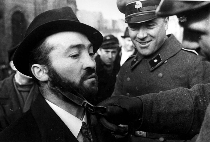 German policemen cut the beards of Jews. - Historical photo, Jews, Third Reich