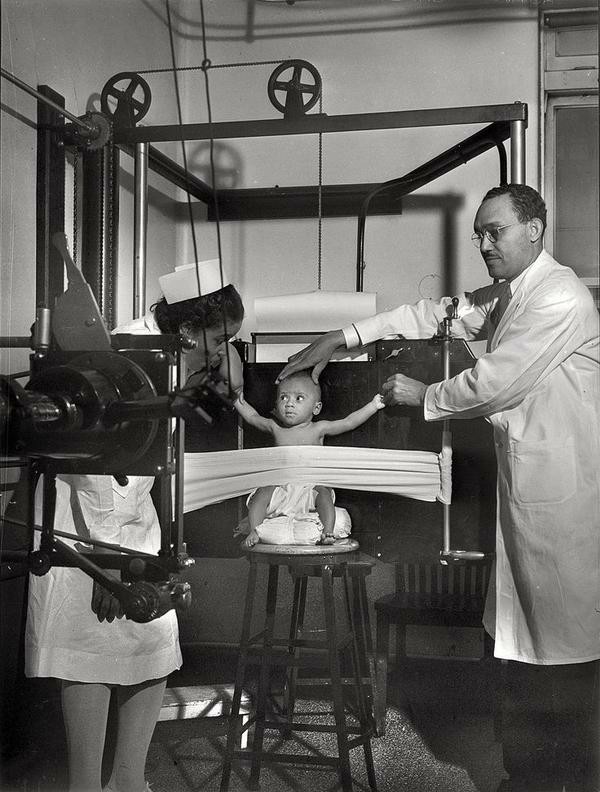 Children are very mobile and taking an X-ray is a whole problem. Provident Hospital, Chicago, USA, 1942 - Black, X-ray, USA