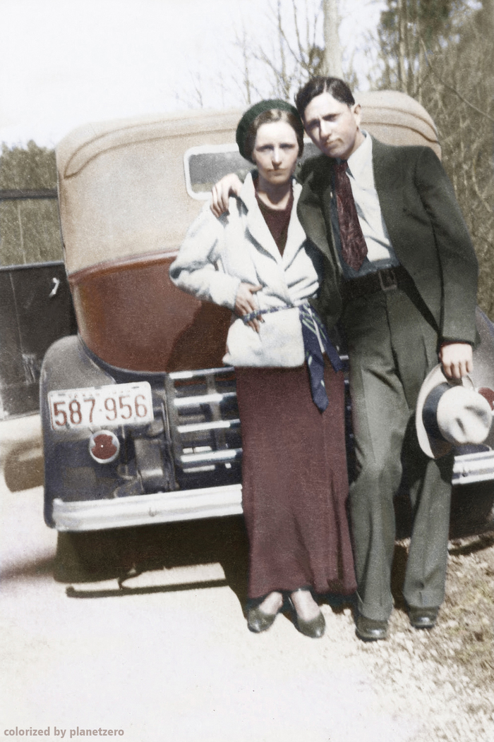    Bonnie Parker and Clyde Barrow posing together in front of car, 1933 , , , , Planetzero,   