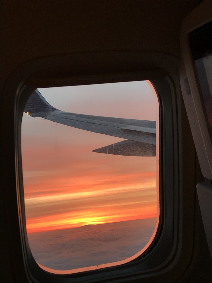 Вид из иллюминатора самолета фото