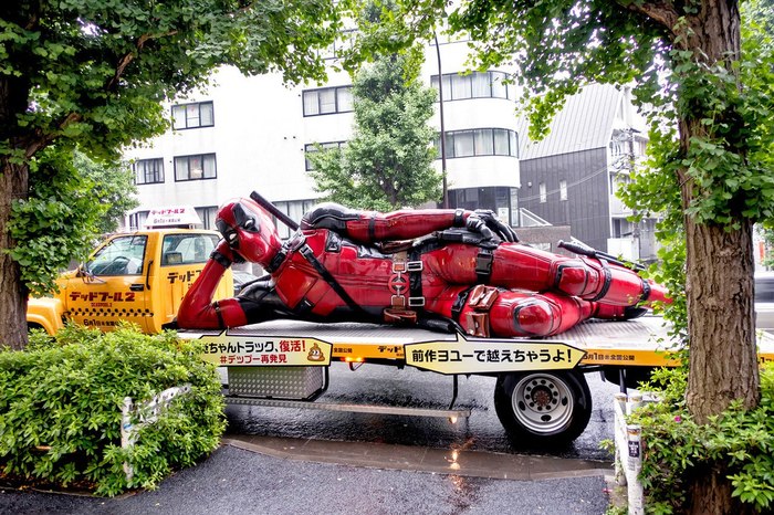 A Deadpool 2 promotional truck drove through the streets of Harajuku in Japan in the rain. - Japan, Advertising, Deadpool