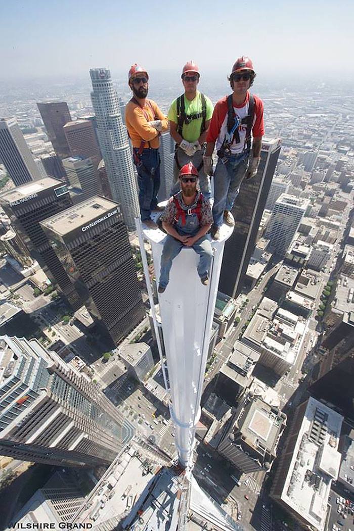 The guys are just standing on the newly built Wilshere Grand Tower in Los Angeles. - Tower, Height, Fearfully