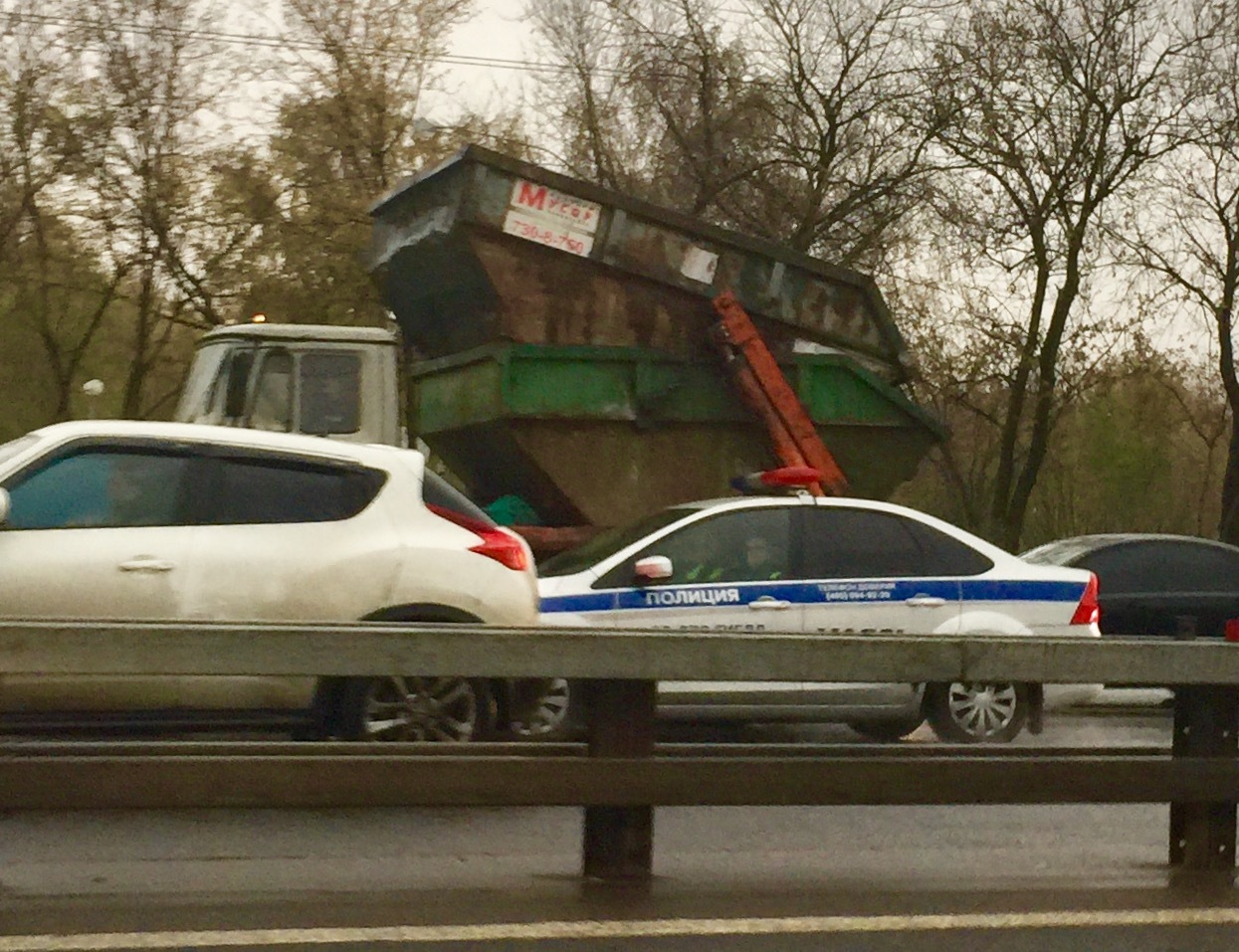 Waste container in which the garbage container was thrown - My, Russia, Container, Car for pumping