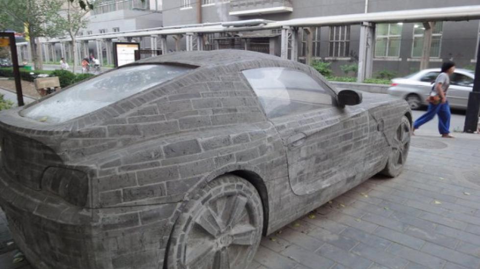 On one of the streets of Beijing (China) you can find an unusual monument - a stone BMW Z4. - Interesting, Informative, China, Sculpture, Auto, Car, Bmw