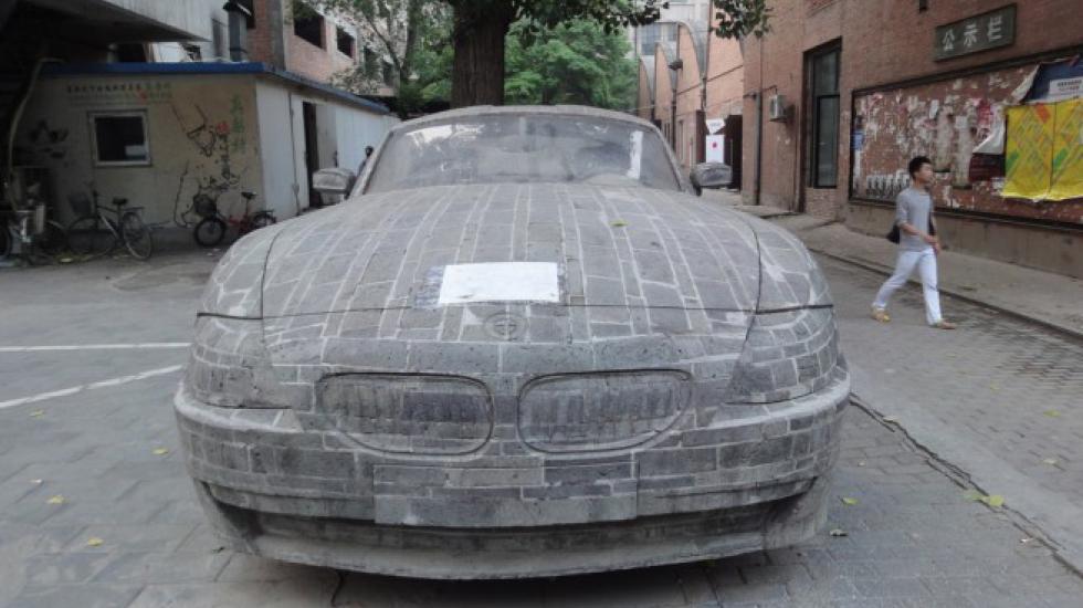 On one of the streets of Beijing (China) you can find an unusual monument - a stone BMW Z4. - Interesting, Informative, China, Sculpture, Auto, Car, Bmw