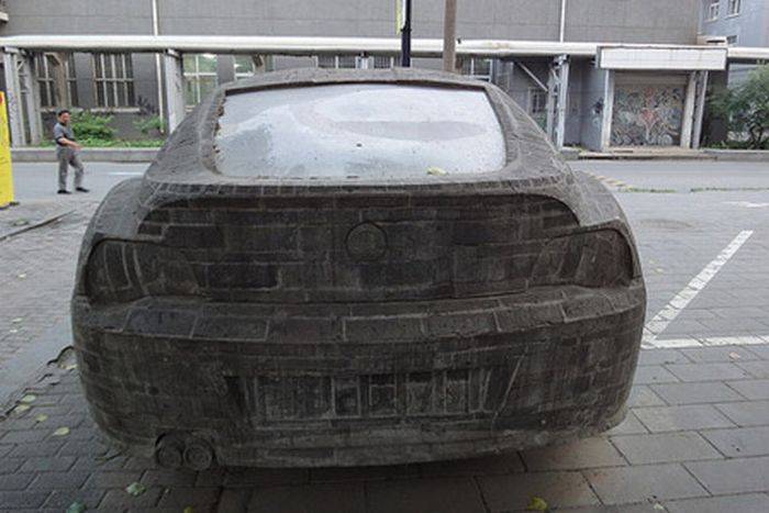 On one of the streets of Beijing (China) you can find an unusual monument - a stone BMW Z4. - Interesting, Informative, China, Sculpture, Auto, Car, Bmw