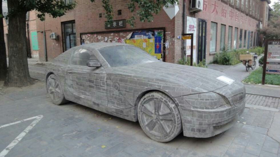 On one of the streets of Beijing (China) you can find an unusual monument - a stone BMW Z4. - Interesting, Informative, China, Sculpture, Auto, Car, Bmw