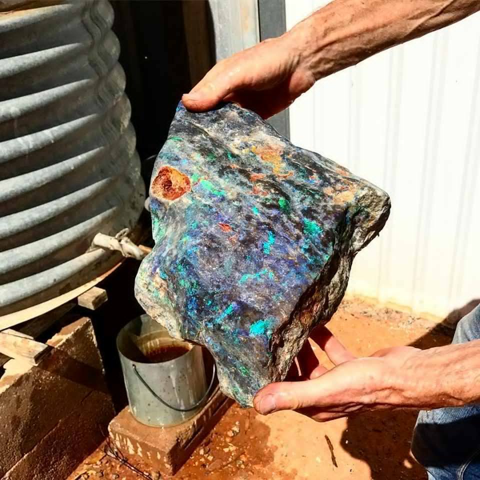 This massive black opal was pulled straight out of a mine in the outback in southern Australia. - Minerals, Gems, Australia