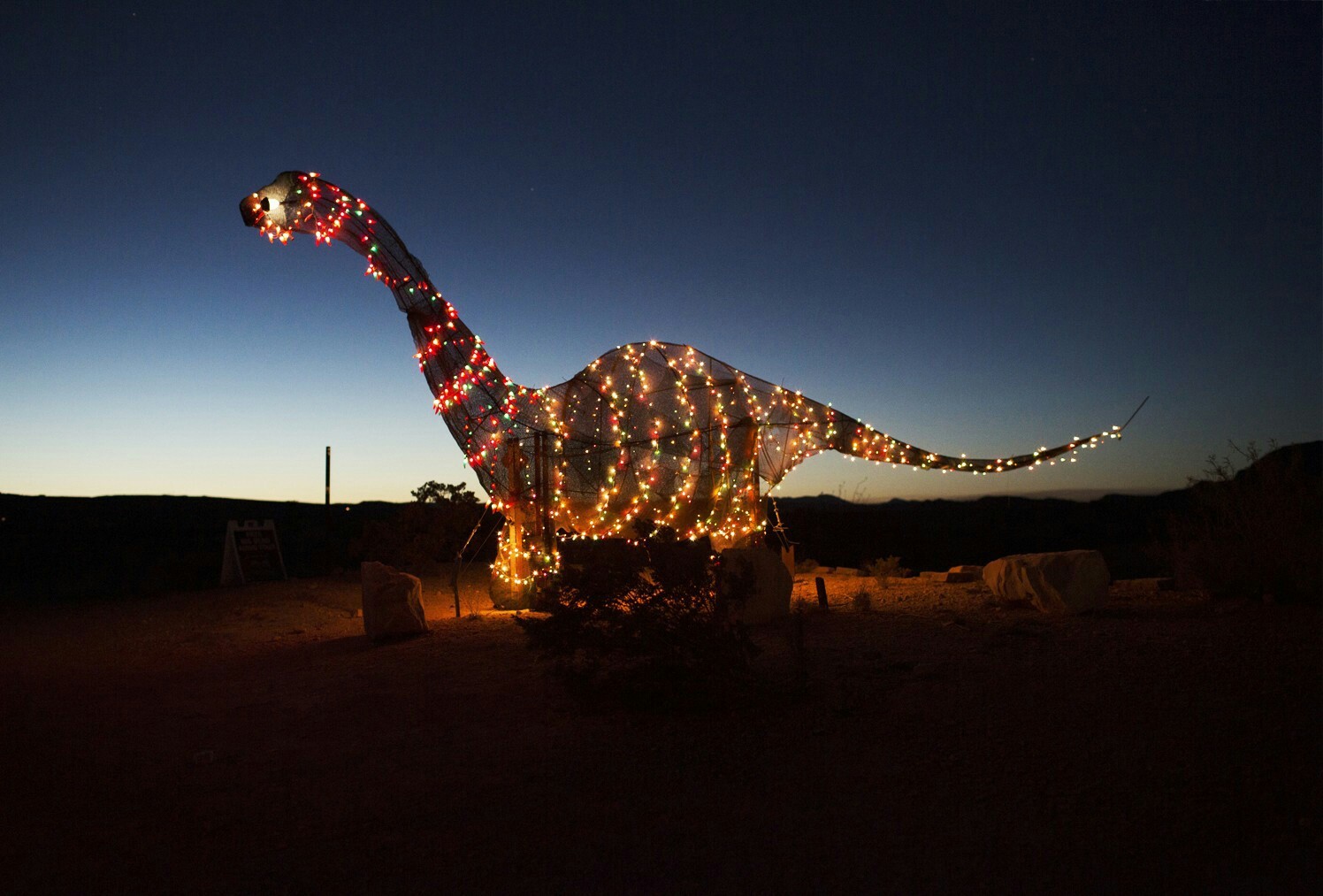 A glowing dinosaur statue in Terlingua, Texas, near the US-Mexico border. - The statue, Dinosaurs, Garland, beauty, , Sculpture, Craftsmanship