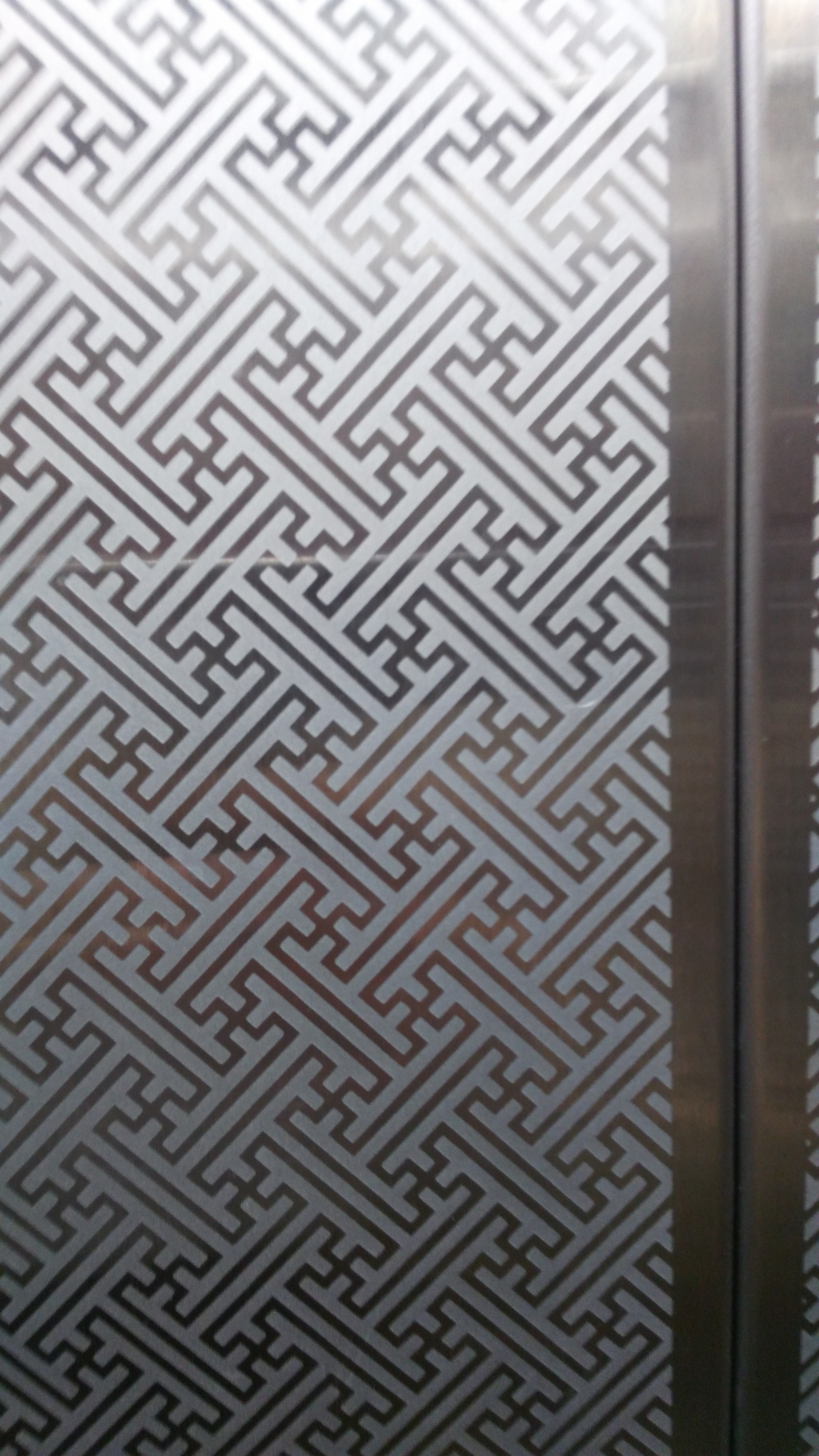 The pattern on the elevator walls in the Hilton New Riga hotel - My, Swastika, Nazis, Unclear