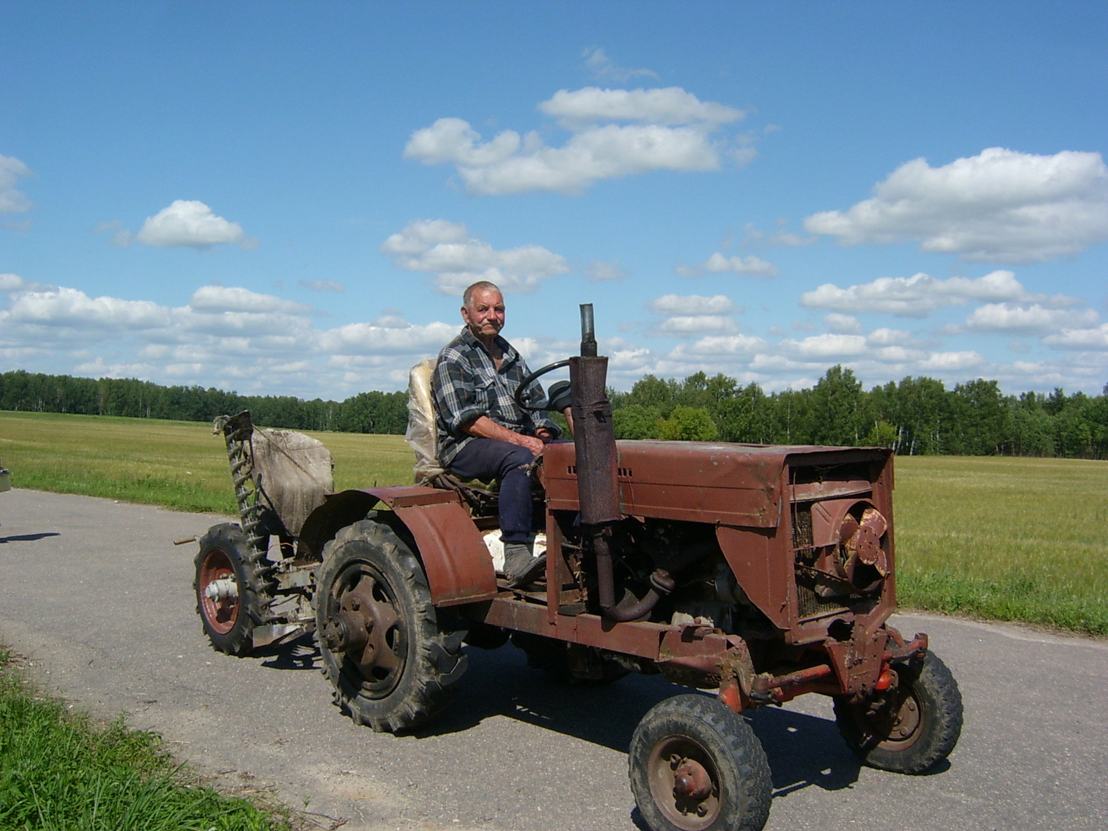 My father assembled a tractor this summer. The LTZ project was taken as a basis. How do you like the miracle of rural technology? - My, Technics, Retro car, Tractor, Tractor driver, With your own hands, Collective farm, Country people