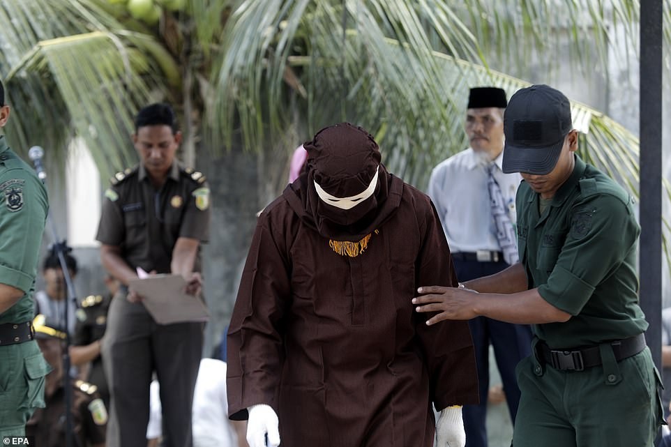 According to Sharia law - Indonesia, Shariah, , Punishment, Longpost, Flogging