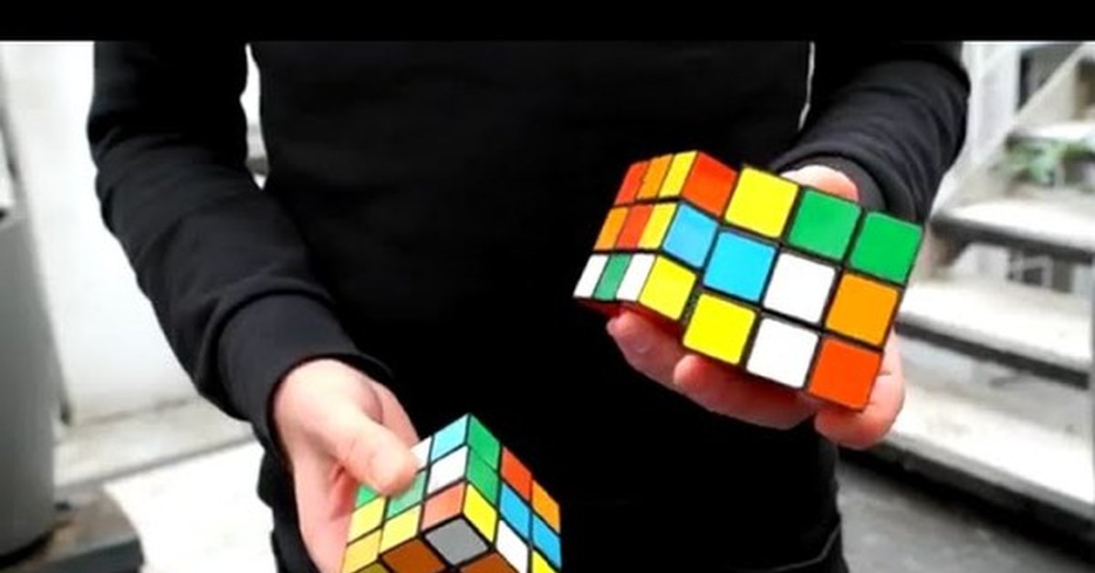 Кубики рубики песня. Кубик Рубика. Человек с кубиком рубиком. Кубик Рубика картинки. Изображение кубика Рубика.
